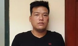 Trịnh Quang Tùng tại cơ quan công an.