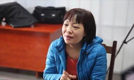 Bị can Đào Thị Thanh Bình tại cơ quan công an.