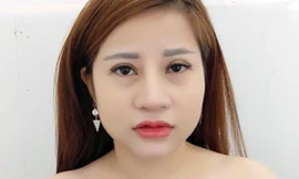 Quách Thị Thắm tại cơ quan công an.