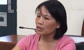 Nữ điều dưỡng Lê Thị Hà tại cơ quan công an.