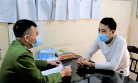 Nguyễn Văn Tùng tại cơ quan công an.