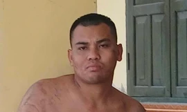 Vũ Văn Cường tại cơ quan công an.