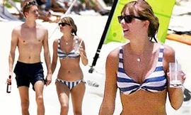 Taylor Swift diện bikini tắm biển cùng bạn trai kém tuổi