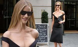 Bạn gái 'Người vận chuyển' diện váy khoét ngực sâu táo bạo