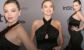Miranda Kerr đẹp rạng ngời, bế bụng bầu dự tiệc
