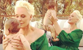 Minh tinh Hollywood U60 trẻ trung bên con gái mới sinh