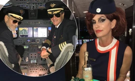 Vợ chồng siêu mẫu Cindy Crawford hóa trang thành cơ trưởng-tiếp viên