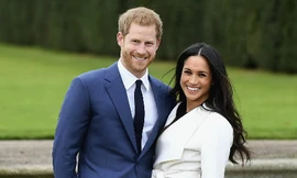 Hoàng tử Harry bên vợ chưa cưới. Ảnh: Standard. 