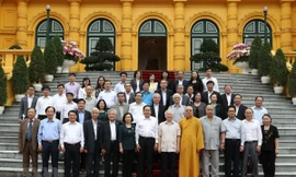 Tổng Bí thư, Chủ tịch nước Nguyễn Phú Trọng và các đại biểu chụp ảnh chung. (Ảnh: Trí Dũng/TTXVN) 