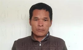 Nghi phạm hiếp dâm Nguyễn Văn Hạnh tại cơ quan công an - Ảnh: Báo Công an Nghệ An 