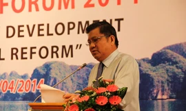 Chủ nhiệm Ủy ban Kinh tế của Quốc hội Nguyễn Văn Giàu khai mạc Diễn đàn kinh tế mùa xuân 2014. Ảnh: Công Khanh