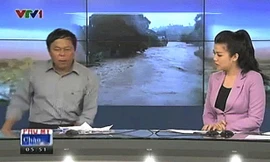 Nhà báo Sỹ Khỏe (trái) trong chương trình "Chào buổi sáng".