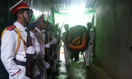 Đám tang đại uý Lường Phát Chiêm được tổ chức theo tang lễ lực lượng công an nhân dân.