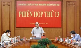 Chủ tịch nước Nguyễn Xuân Phúc, Trưởng Ban Chỉ đạo Cải cách Tư pháp Trung ương phát biểu. (Ảnh: TTXVN) 