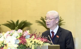 Tổng Bí thư, Chủ tịch nước Nguyễn Phú Trọng báo cáo Quốc hội tại kỳ họp thứ 11. Ảnh Như Ý