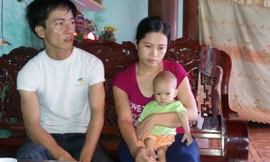 Vợ chồng Thắm Tuấn và cháu Khánh An. Ảnh: Tuấn Nguyễn.