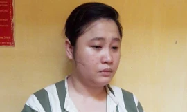 Má mì Hòa tại cơ quan điều tra