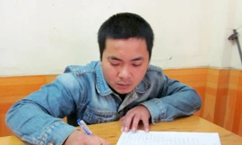 Tài xế Nguyễn Huy Thắng tại trụ sở công an. Ảnh: An Phú