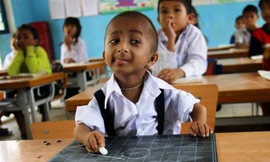 Hình ảnh cậu học sinh K'Rể nhỏ bé ngày nào.