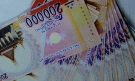 Mang tiền âm phủ mua vàng, xe và lừa đổi tiền thật