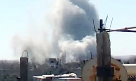 Khói lửa bốc lên từ các vụ nổ ở Damascus Ảnh: Ria-Novosti