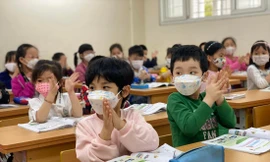 Vẫn còn nhiều ý kiến khác nhau về vấn đề giảm tải trong SGK mớiảnh: Quỳnh Anh