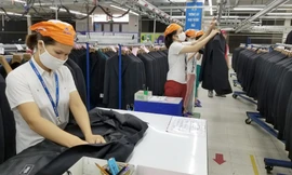 Công nhân và doanh nghiệp gặp khó khăn đang rất cần được hỗ trợ Ảnh minh họa: Phạm Thanh