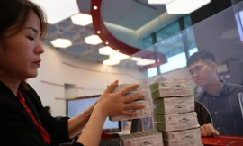 Nhiều doanh nghiệp, người dân vẫn phải chịu mức lãi suất cho vay caoẢnh: Như Ý