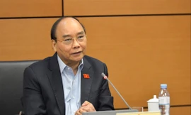 Chủ tịch nước Nguyễn Xuân Phúc tại phiên thảo luận ở Quốc hội