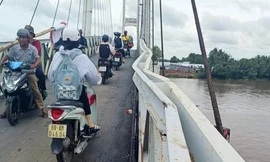 Chủ tịch Cà Mau yêu cầu xử lý vụ xe 31 tấn làm biến dạng cầu tải trọng 3,5 tấn