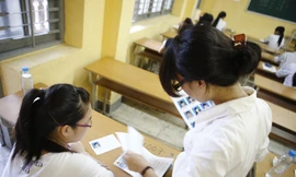 Thí sinh dự thi tại Đaị học Ngân hàng Hà Nội. Ảnh: Như Ý