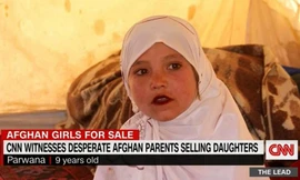 Cô dâu 9 tuổi Parwana Malik lúc bị gả bán hồi tháng 10. Ảnh: CNN.