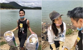 Vợ chồng trẻ dọn rác bảo vệ môi trường 