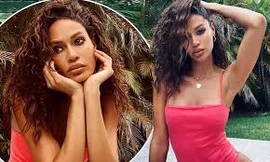 'Chân dài' cao 1m79 Joan Smalls khoe dáng với áo tắm đỏ rực