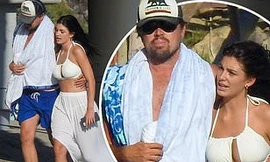 Leonardo DiCaprio tình tứ ôm eo bạn gái kém 23 tuổi dạo biển