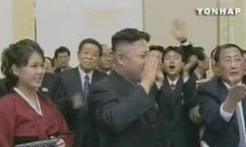 Tân lãnh đạo CHDCND Triều Tiên Kim Jong Un cùng phu nhân trong bữa tiệc chúc mừng phóng thành công tên lửa