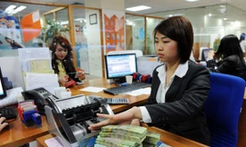 Phòng chống rửa tiền là dự án luật còn gây nhiều tranh luận (ảnh minh họa). Ảnh: Thanh Hải