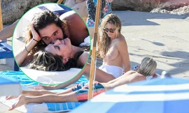 Heidi Klum phơi ngực trần, tình tứ với chồng trẻ kém 16 tuổi trên bãi biển