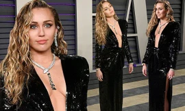 Miley Cyrus diện đầm xẻ sâu hờ hững cùng chồng dự tiệc Oscar
