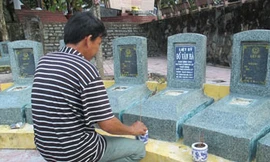 Gắn trộm bia lên mộ liệt sĩ vô danh