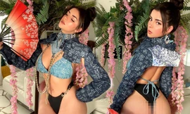 ‘Nữ hoàng nội y’ nước Anh phô diễn đường cong phồn thực với bikini bé xíu