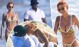 Mỹ nhân Tina Louise hôn đắm đuối ‘trùm’ hip-hop trên bãi biển