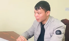 Quang tại cơ quan điều tra. Ảnh: Công an cung cấp.