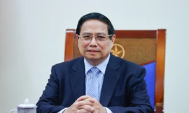 Thủ tướng Phạm Minh Chính trong cuộc điện đàm với Thủ tướng Malaysia. Ảnh: VGP