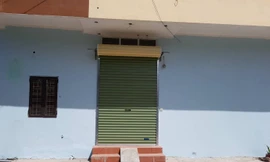 Ngôi nhà được cho là nơi bà L. trông giữ trẻ.