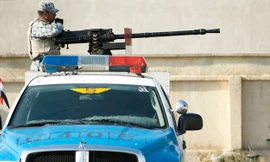 Một binh sĩ Iraq và khẩu súng KPV khi tham gia chiến dịch giải phóng Mosul.