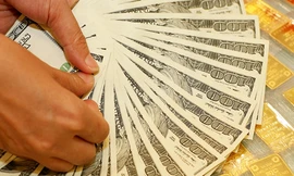 Giá vàng và USD đồng loạt giảm giá, ảnh minh hoạ 