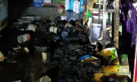 Người đàn ông bịt mặt bất ngờ ném 'bom xăng' vào nữ chủ cửa hàng tạp hóa