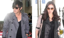 Vợ chồng Jang Dong Gun sành điệu ở sân bay