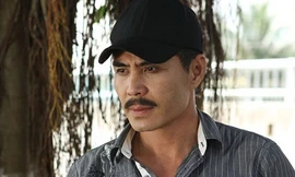 Diễn viên Trung Dũng trong phim Những kẻ hai mặt. (Ảnh do đoàn làm phim cung cấp)